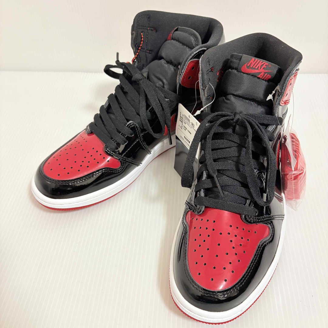 Jordan Brand(NIKE)(ジョーダン)の【新品】ナイキ エアジョーダン1 ハイ OG パテントブレッド 27.0 レッド メンズの靴/シューズ(スニーカー)の商品写真