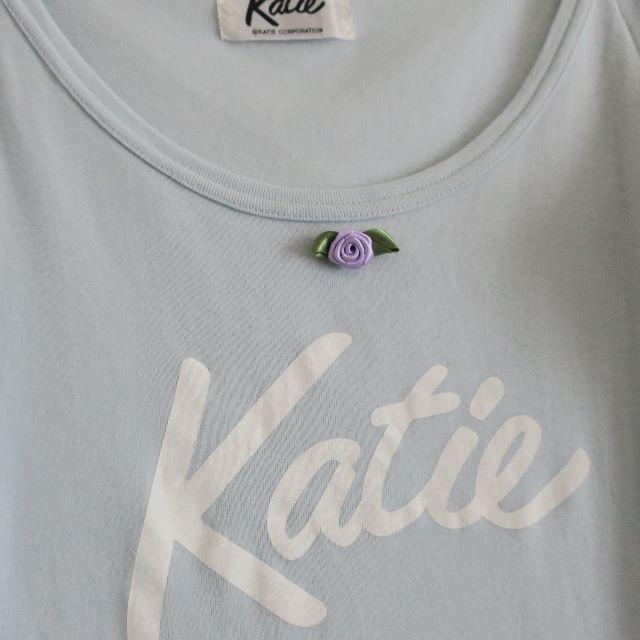 katie CROSS LOGO トップス