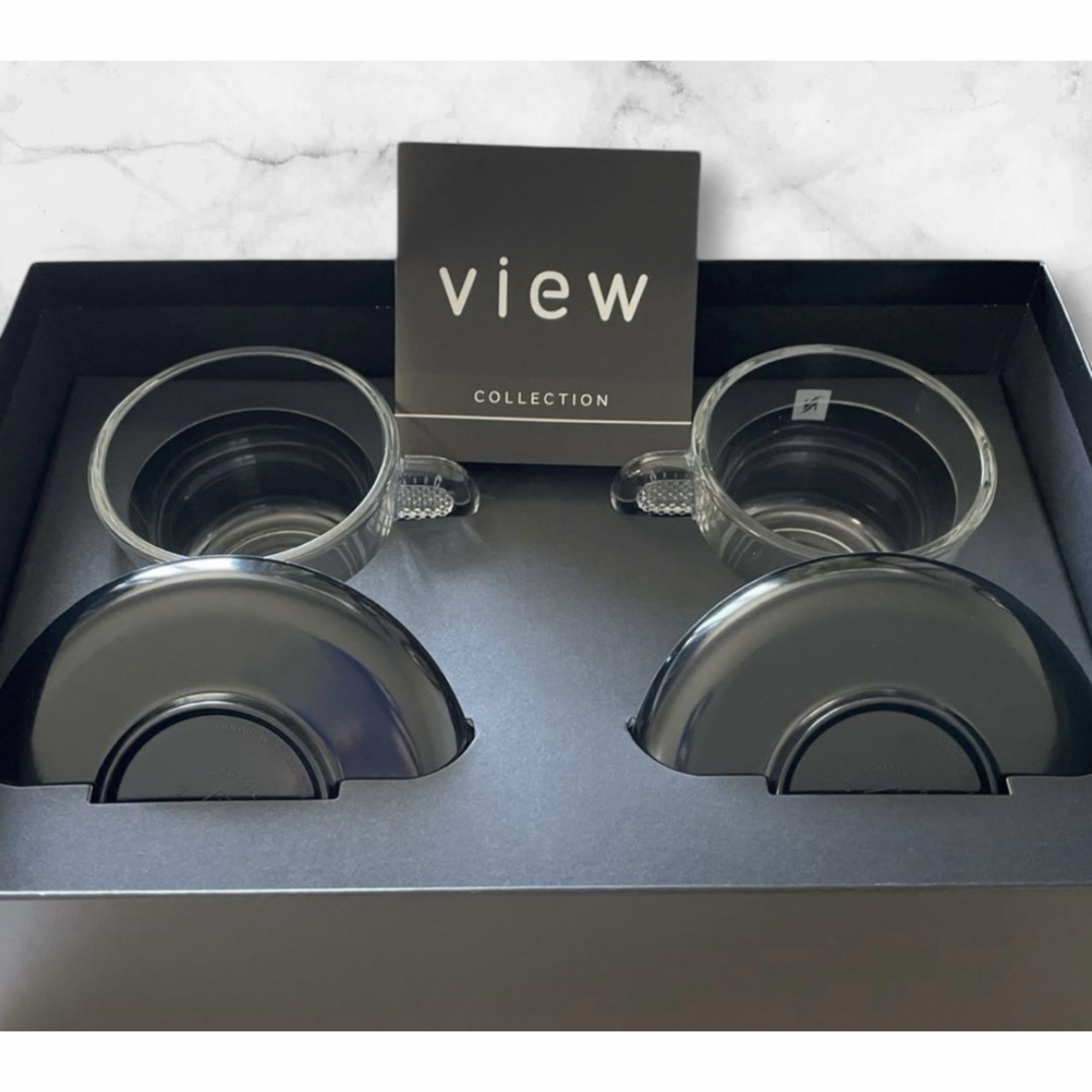 NESPRESSO(ネスプレッソ)の新品Nespresso ガラスカップ & ソーサー2客セット インテリア/住まい/日用品のキッチン/食器(グラス/カップ)の商品写真