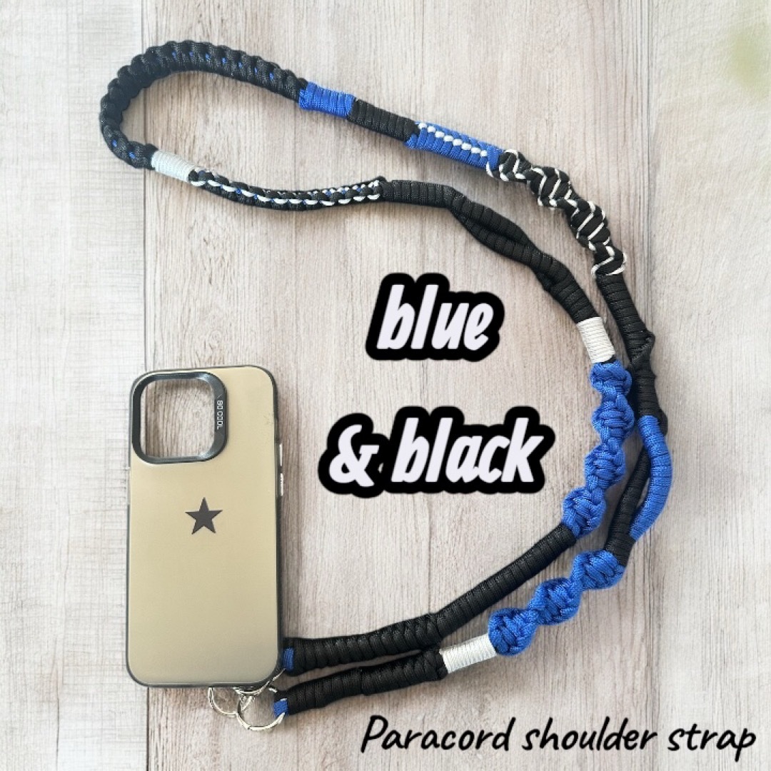 スマホショルダーストラップ　パラコード　黒　青　白　携帯ストラップ ハンドメイドのスマホケース/アクセサリー(スマホストラップ/チャーム)の商品写真