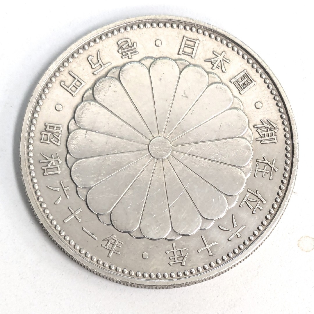 MF⑤ 天皇陛下御在位60年記念1万円銀貨 ブリスターパックなし エンタメ/ホビーの美術品/アンティーク(貨幣)の商品写真