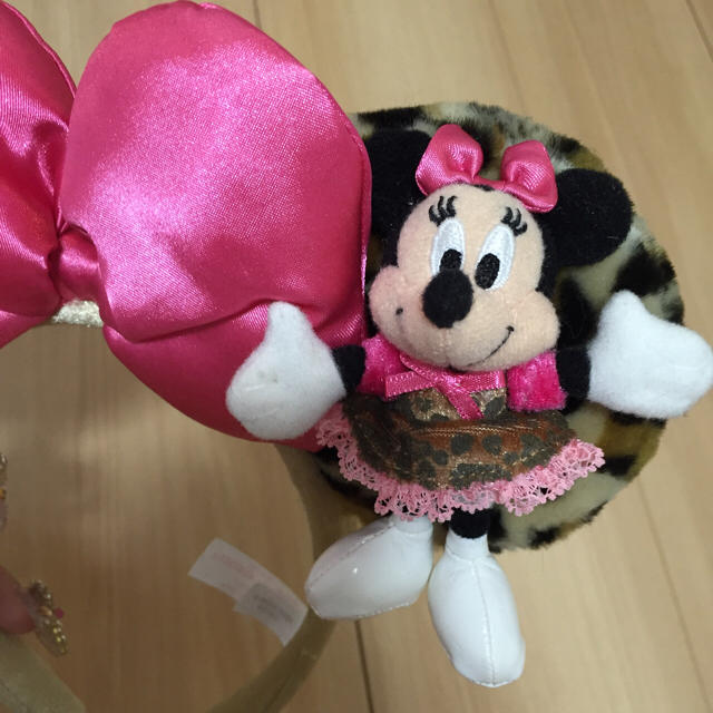 Disney(ディズニー)のディズニーランド ミニーちゃんカチューシャ エンタメ/ホビーのおもちゃ/ぬいぐるみ(キャラクターグッズ)の商品写真