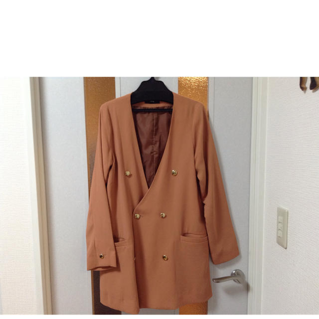 OSMOSIS(オズモーシス)のオズモーシス オレンジ春コート レディースのジャケット/アウター(スプリングコート)の商品写真