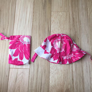 ベビーギャップ(babyGAP)のbaby Gap 帽子 0-6ヶ月 42㎝ リバーシブル ピンク 花柄 収納袋付(帽子)