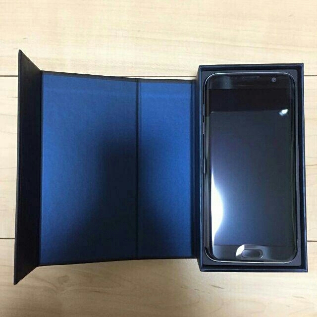 SAMSUNG(サムスン)のGalaxy S7 edge SCV33 ブラックオニキス 一括購入品 判定○ スマホ/家電/カメラのスマートフォン/携帯電話(スマートフォン本体)の商品写真