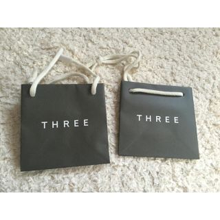 スリー(THREE)のTHREE シール付き ショップ袋(ショップ袋)