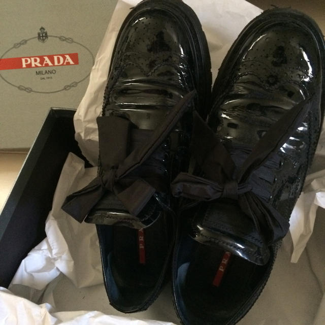 PRADA(プラダ)のPRADA美品ウィングチップ レディースの靴/シューズ(スリッポン/モカシン)の商品写真