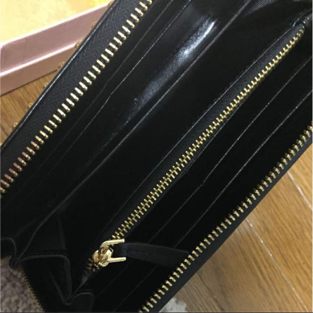 ▷miumiu スタッズ付き長財布 - 財布