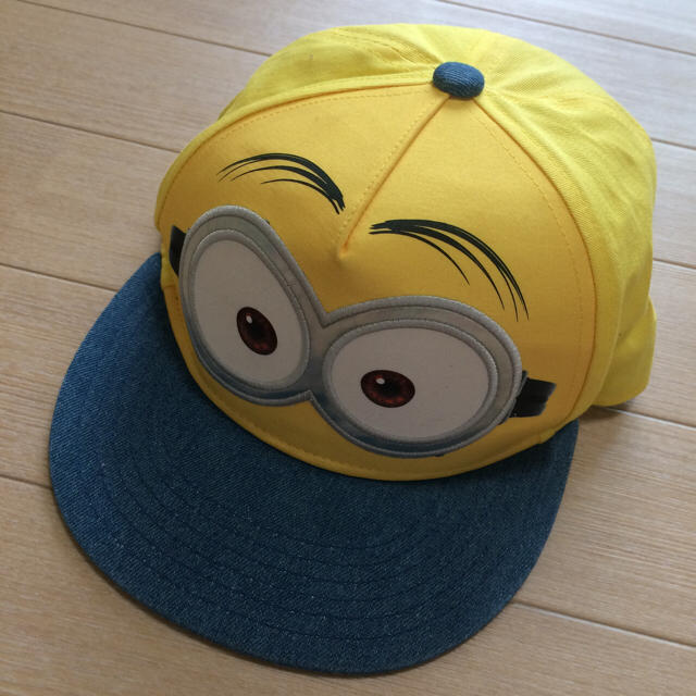 ミニオン 公式 USJ ユニバ キャップ 帽子 ボブ 黄色 Tシャツ 新品 エンタメ/ホビーのおもちゃ/ぬいぐるみ(キャラクターグッズ)の商品写真