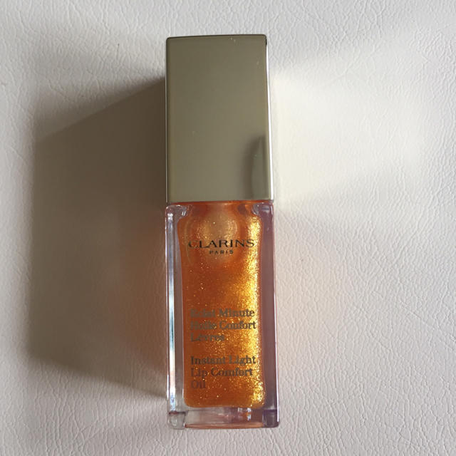 CLARINS(クラランス)の新品 クラランス リップオイル 07 ハニーグラム コスメ/美容のベースメイク/化粧品(リップグロス)の商品写真