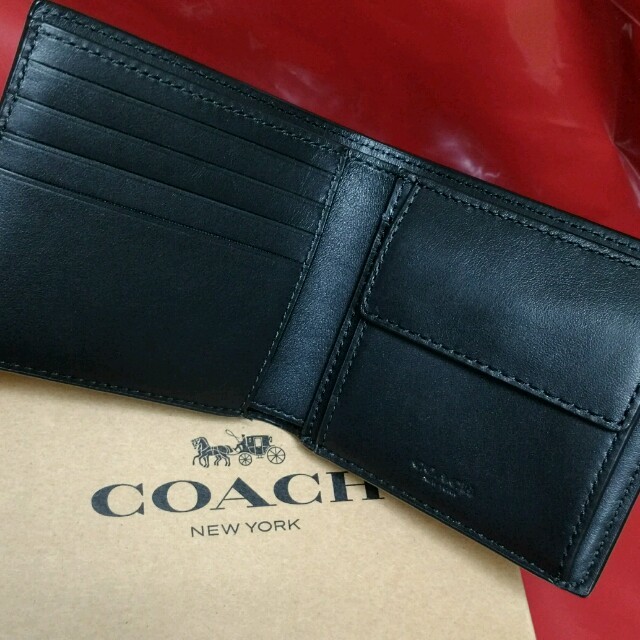 COACH(コーチ)のCOACH (コーチ)
メンズ 折り財布  シグネチャー　型押し　黒 メンズのファッション小物(折り財布)の商品写真