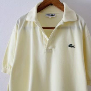 ラコステ(LACOSTE)のラコステ　薄い黄色　ポロシャツ　古着　文字ワニ(ポロシャツ)