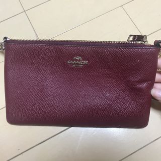 コーチ(COACH)のCOACH スウィングバッグ ワインレッド(リュック/バックパック)