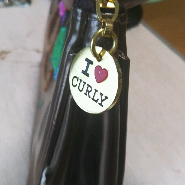 Curly Collection(カーリーコレクション)のカーリーコレクションポーチお値下げ レディースのファッション小物(ポーチ)の商品写真