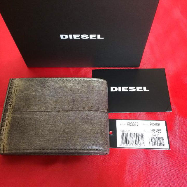 DIESEL(ディーゼル)の新品17SS新作 DIESEL ディーゼル スタープリント 二つ折り財布 メンズのファッション小物(折り財布)の商品写真