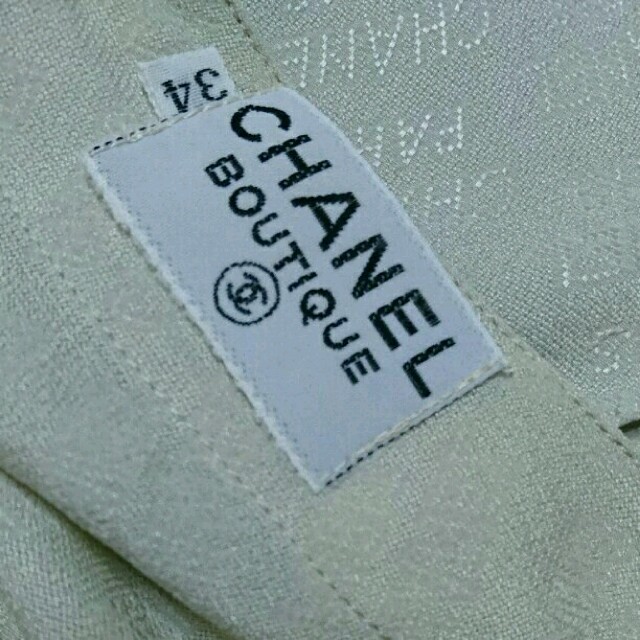 CHANEL(シャネル)のなな様専用 シャネル シルク カットソー ノースリーブ ロゴ生地 レディースのトップス(カットソー(半袖/袖なし))の商品写真