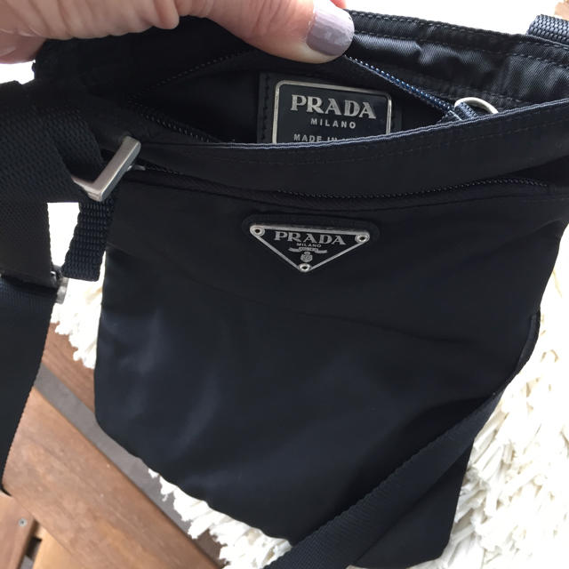 PRADA(プラダ)のPrada ポシェット ・黒 。 レディースのバッグ(その他)の商品写真