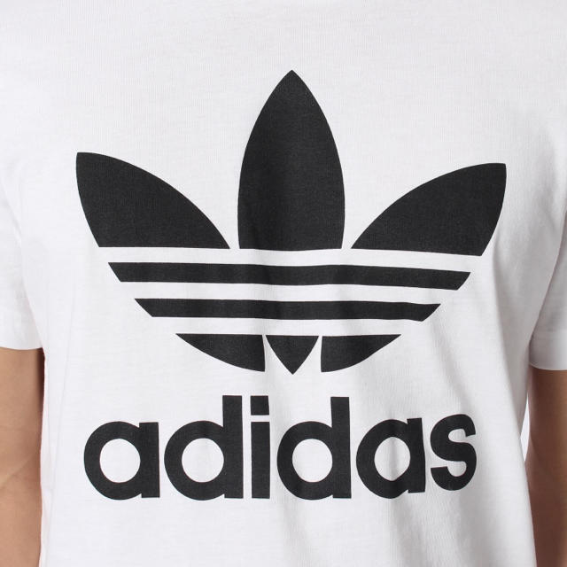 adidas(アディダス)の【新品未使用】adidasTシャツカットソーサイズXS白AJ8828デカロゴ メンズのトップス(Tシャツ/カットソー(半袖/袖なし))の商品写真